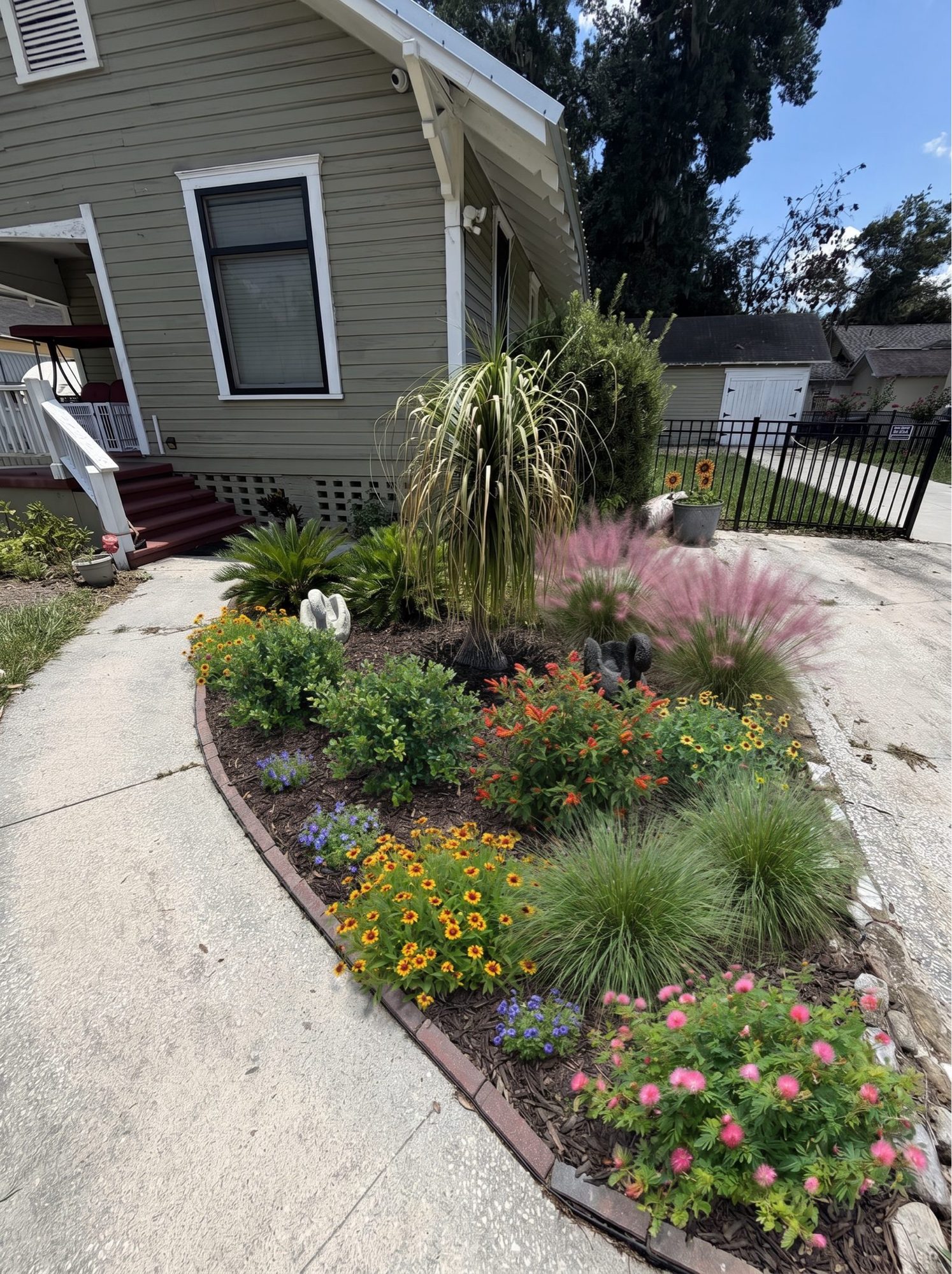 3D rendering of a cottage foundation bed with grasses and flowers